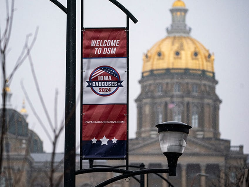 A caucus sign near the Iowa State Capitol in Des Moines, Iowa, US, on Monday, Jan. 8, 2024. Former UN Ambassador Nikki Haley and Florida Governor Ron DeSantis will face off in a presidential debate on Wednesday as they duel for the mantle of chief rival to Donald Trump for …