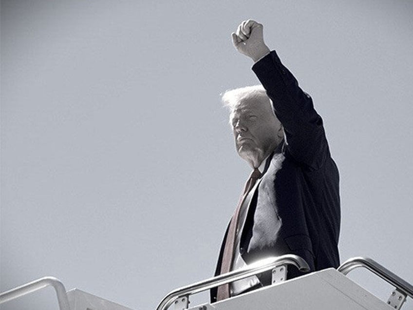 Republican presidential nominee former President Donald Trump gestures as he boards a plan