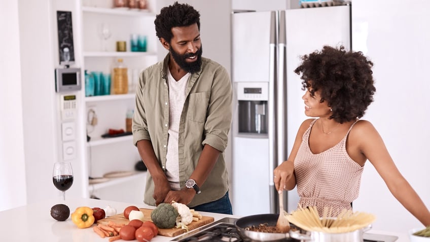 couple cooking together