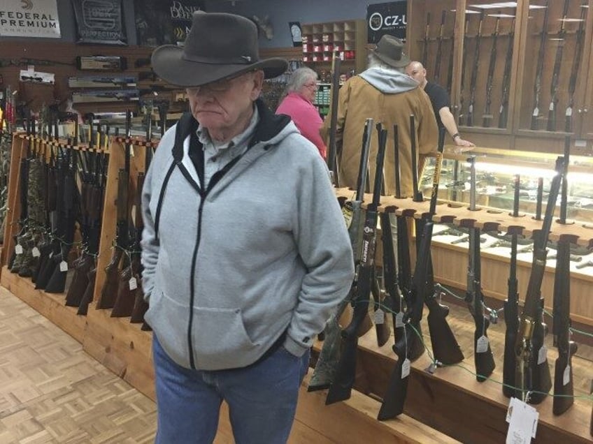 Retired computer programmer and firearms enthusiast Cephas Wright peruses the wares at The Outdoorsman gun shop in Santa Fe, N.M., on Thursday, Jan. 5, 2017. Currents in the national debate over gun regulations are converging on New Mexico as the state Legislature prepares to meet. Wright criticized a new proposal …