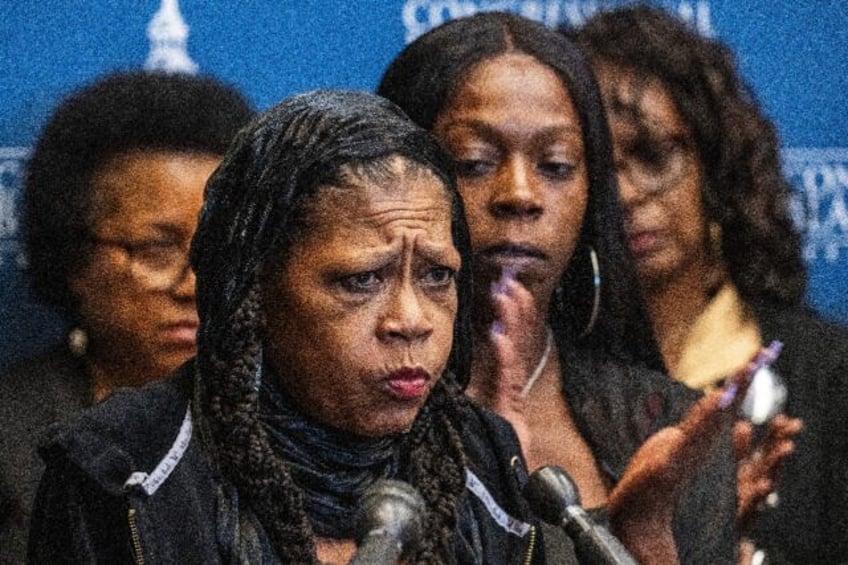 Sonya Massey's mother, Donna Massey (C), addresses a 'Police Violence and Reform' press co