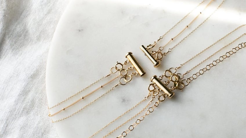 Wearing layered necklaces is easier with this clasp.