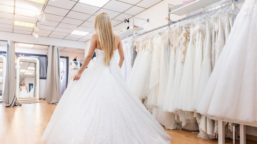 bride in bridal dress shop