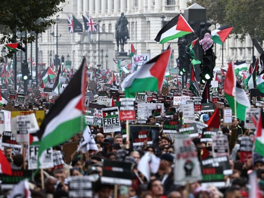 100000 protest against israel in london as antifa and islamist flags fly