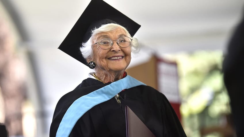 Virginia Hislop, 105, smiles upon receiving her graduate degree from Stanford University.