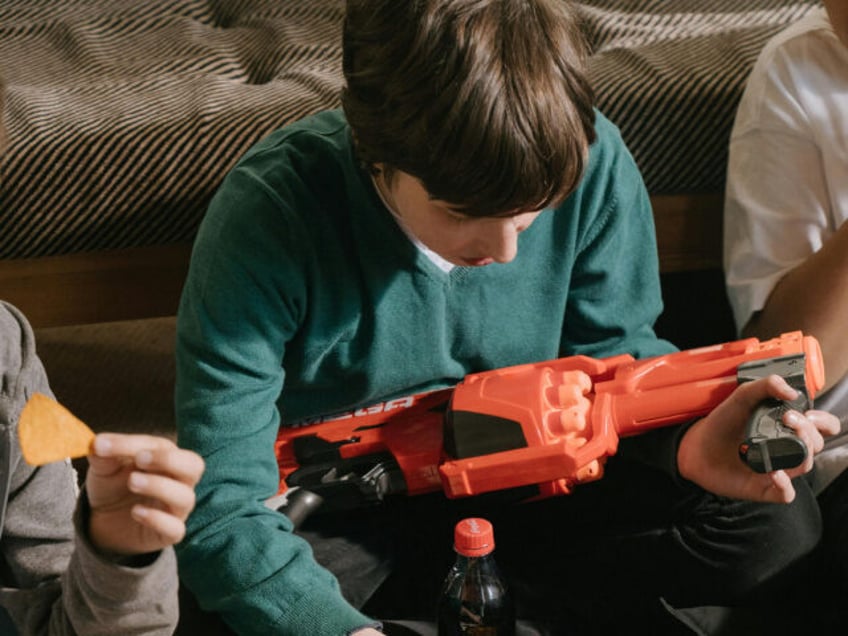 Boy With Toy Gun