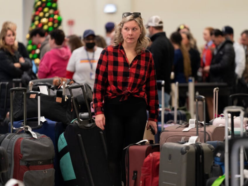 Ashlyn Harmon of New Orleans searches for her Southwest Airlines bags amongst hundreds of others at Midway International Airport as Southwest continues to cancel thousands of flights across the country Wednesday, Dec. 28, 2022, in Chicago. Harmon said her family's initial Southwest flight was cancelled on Christmas so they rebooked …