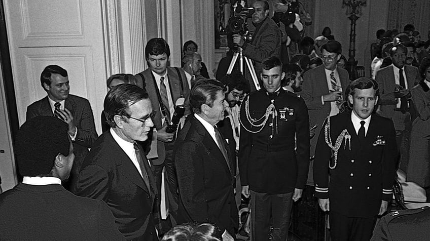 President Ronald Reagan and Vice-President George H.W. Bush officiate in a Black History Month event in 1984