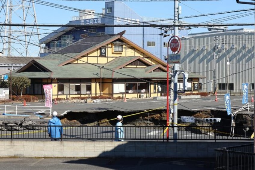 Rescue efforts in Yashio have been severely hampered by unstable ground around the hole an