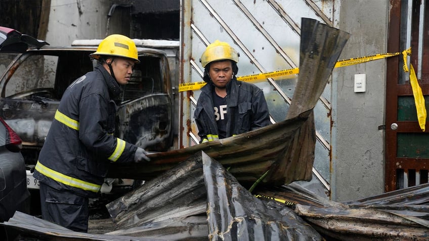 15 dead after philippine firefighters arrive late to factory blaze delay caused by rain wrong address