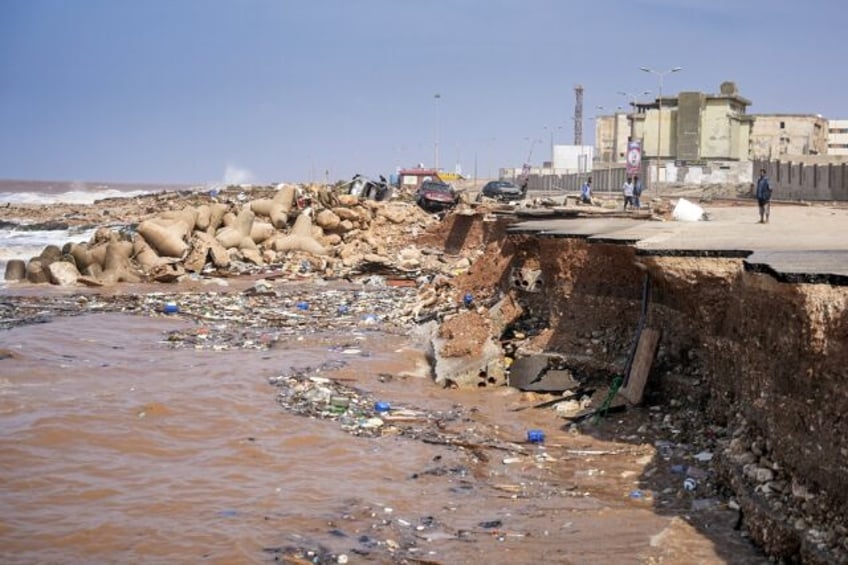 150 dead as catastrophic storm floods hit east libya