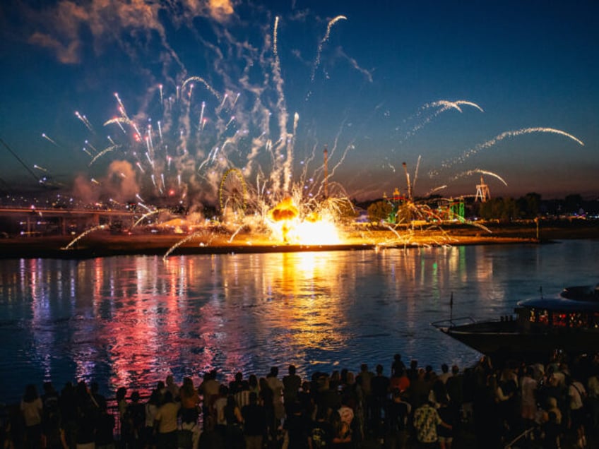 DUSSELDORF, GERMANY - JULY 18: Fireworks explode by mistake on the ground during a drone a