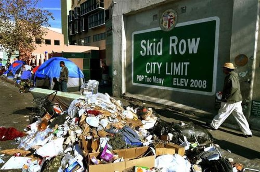 19 story first class housing tower opens on las skid row features art music rooms 