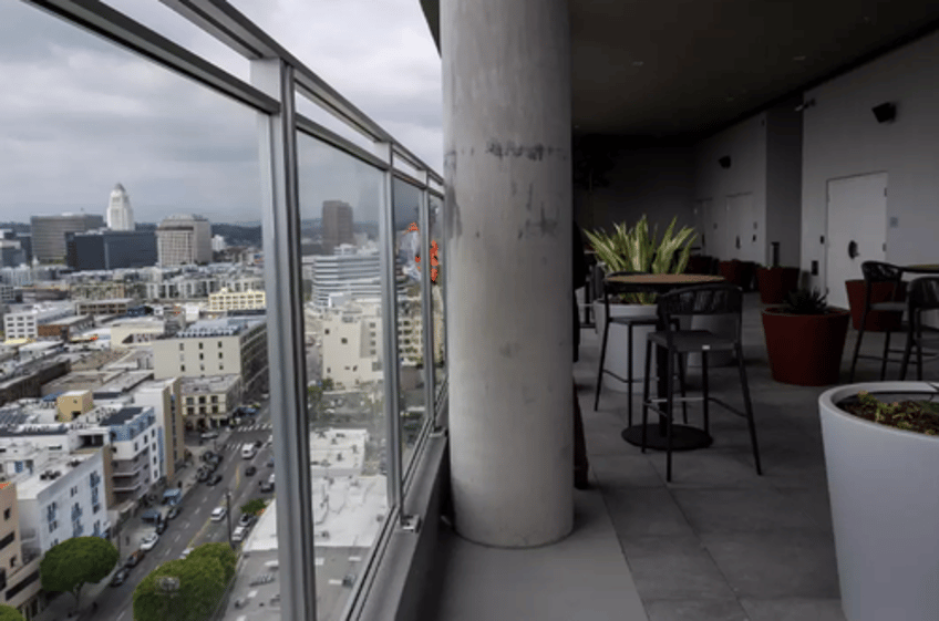 19 story first class housing tower opens on las skid row features art music rooms 