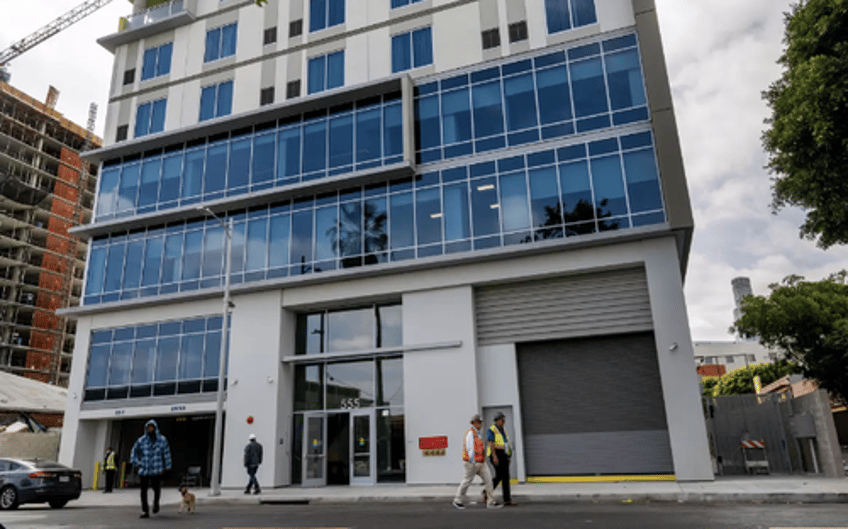 19 story first class housing tower opens on las skid row features art music rooms 