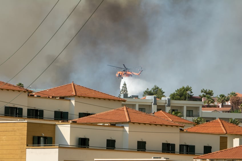 19000 people evacuated from greek island of rhodes as wildfires continue