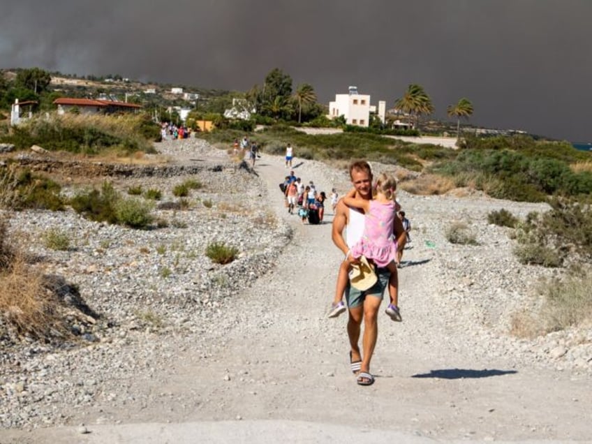 19000 people evacuated from greek island of rhodes as wildfires continue