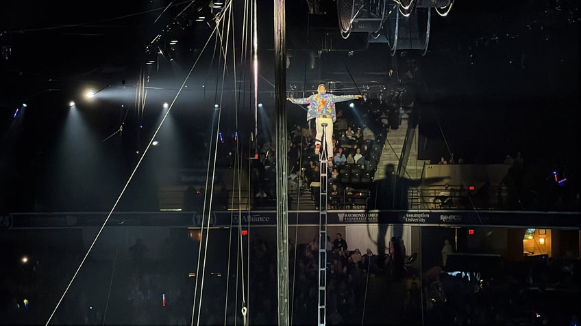 Wesley Williams riding record-breaking unicycle at circus