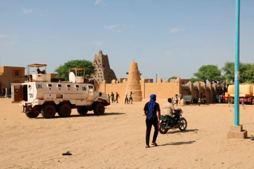 2 attacks by islamist insurgents in mali leave 49 civilians and 15 soldiers dead military says