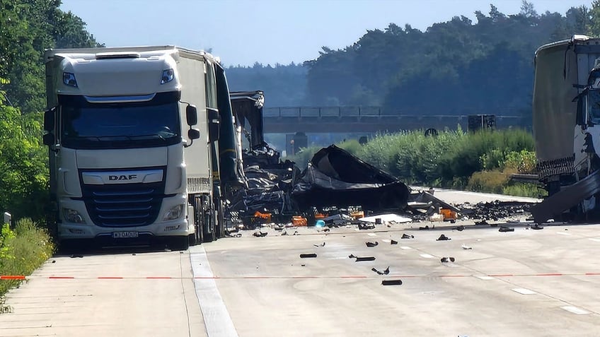 2 killed in germany after multi truck highway crash releases hazardous materials