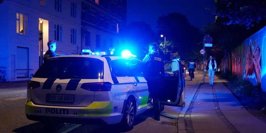 2 masked gunmen in copenhagen open fire inside building killing a man and injuring 4 others