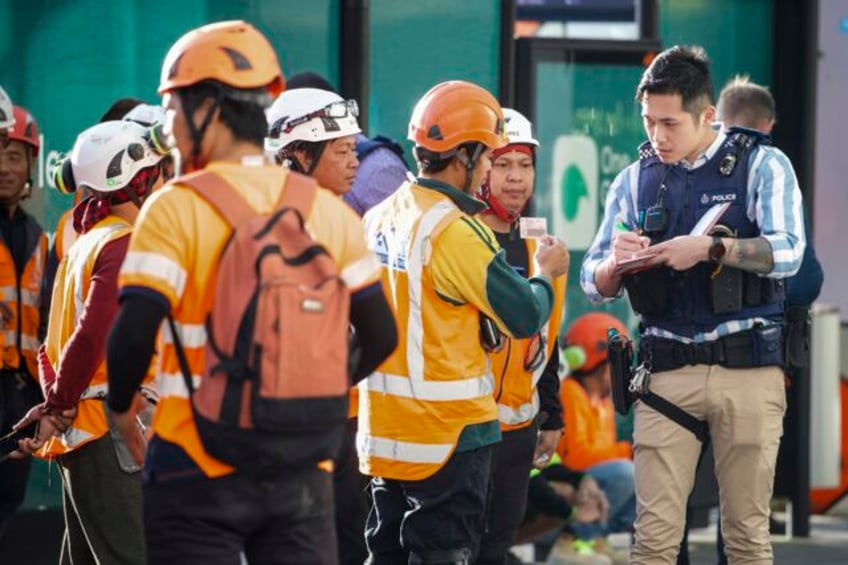 2 men killed in new zealand shooting were co workers of gunman who had violent past