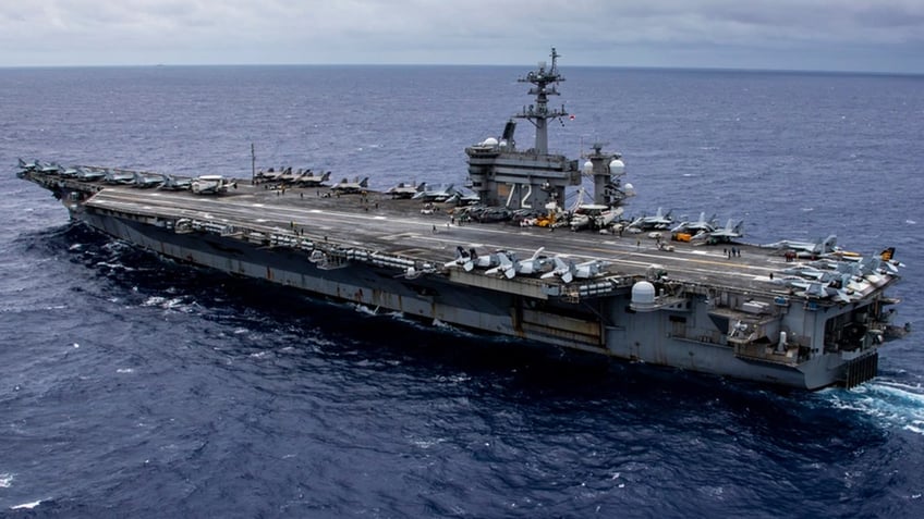 USS Abraham Lincoln sails in Pacific