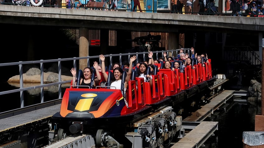 Close up of riders on Disney's Incredicoaster