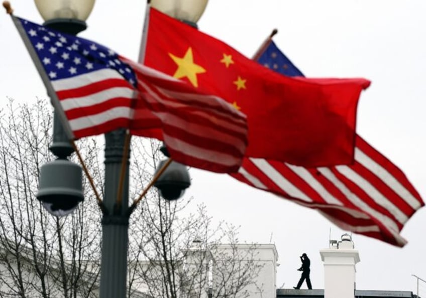 The United States charged seven Chinese nationals for participating in a campaign to force