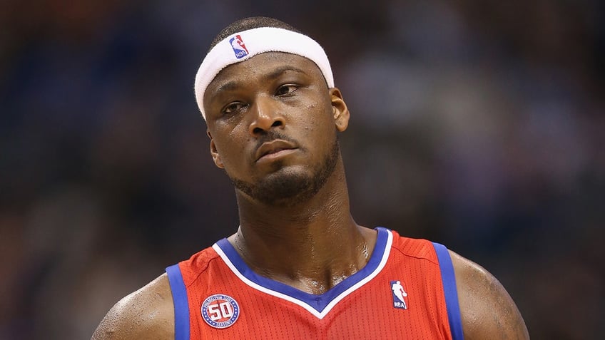 Kwame Brown looks on court