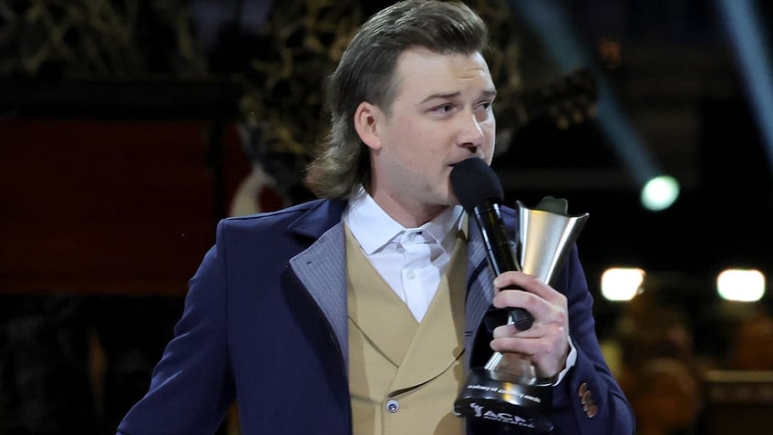 Morgan Wallen appeared to move on from his public scandal as he took home an award for album of the year with "Dangerous: The Double Album."