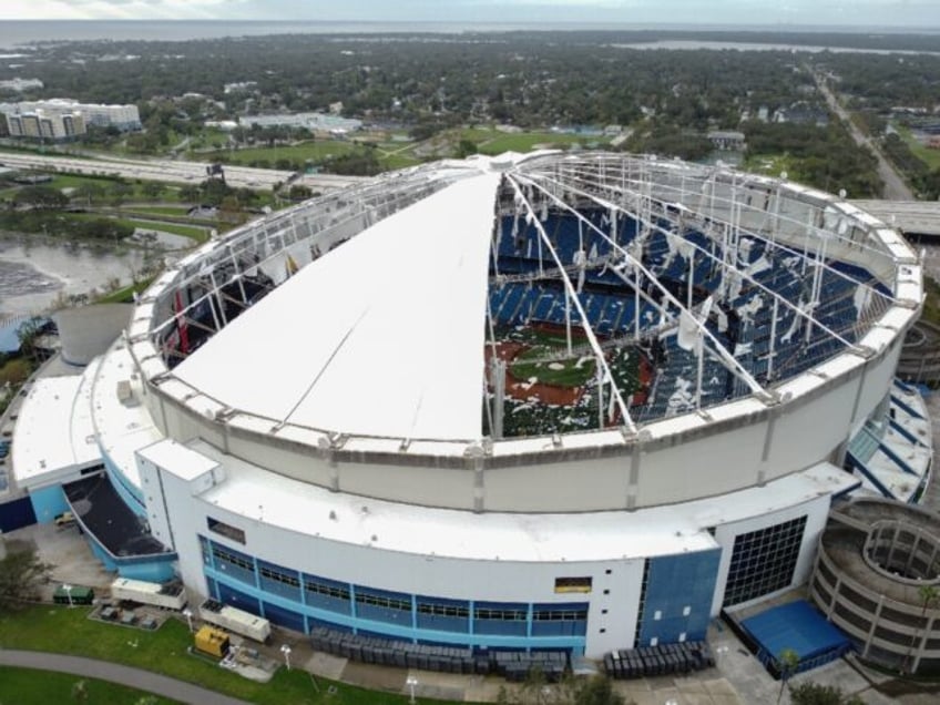 A drone image shows the dome of Tropicana Field which has been torn open due to Hurricane