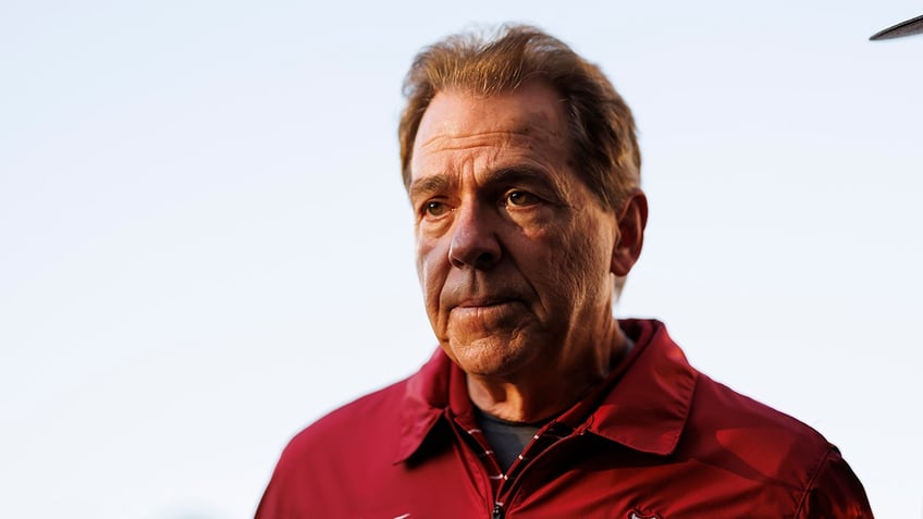 Nick Saban stares on field