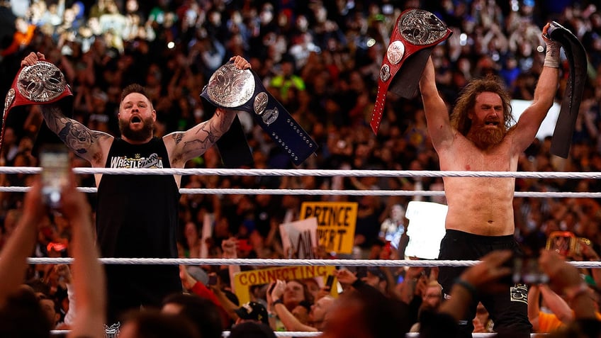 Sami Zayn and Kevin Owens celebrate