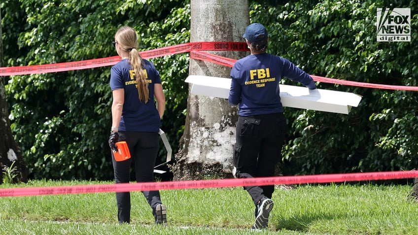 FBI techs behind police line at Trump golf course