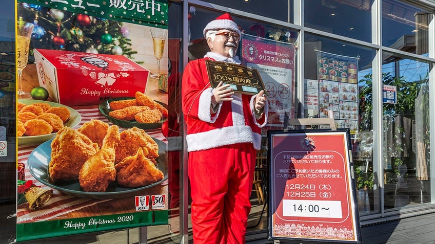 Colonel Sanders statue dressed as Santa