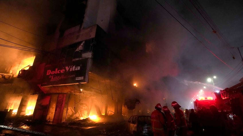 3 dead in southern pakistan as fire tears through commercial building