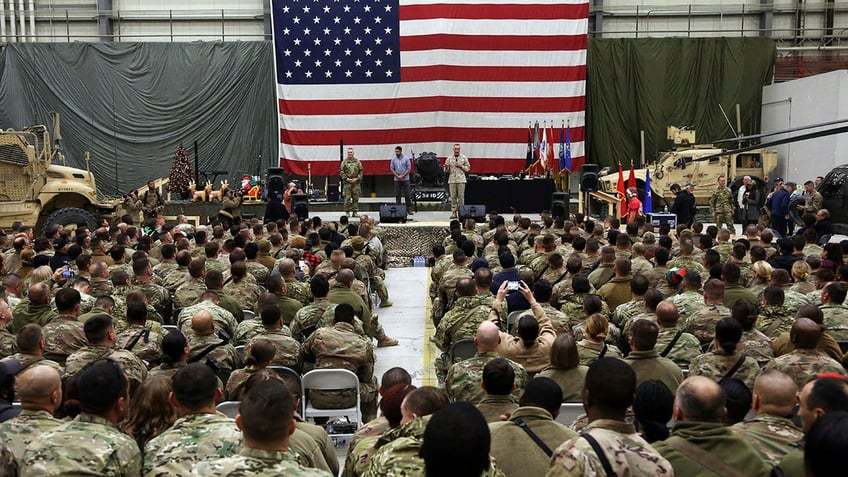 Gen. Joseph Dunford, chairman of the Joint Chiefs of Staff speaks during a ceremony on Christmas Eve at Bagram Air Base, in Afghanistan. (AP Photo/Rahmat Gul, File)