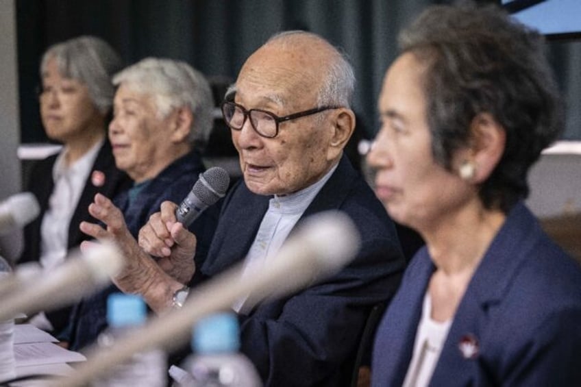 Terumi Tanaka (2nd R), co-chair of Japanese atomic bomb survivors' group Nihon Hidankyo,