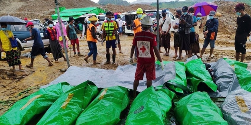 33 bodies recovered following landslide at jade mine in burma rescuers continue search for 3 missing people