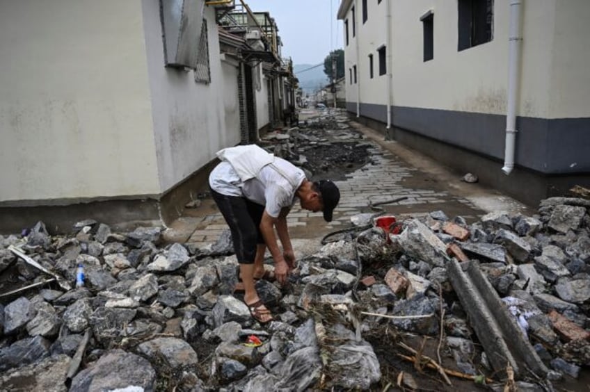 33 dead 18 still missing after record beijing rains officials