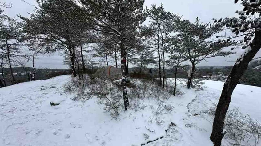 student's tent on snowy Courthouse Rock