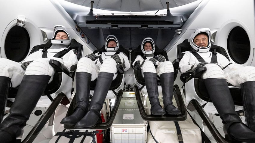 Four astronauts after landing in the Gulf of Mexico