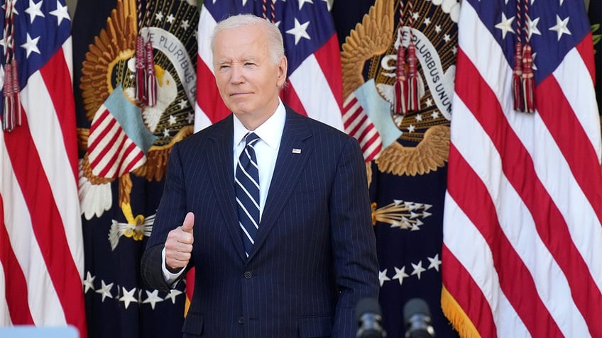 President Biden giving thumbs up 