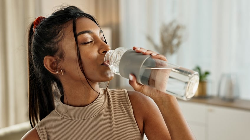 woman drinking water