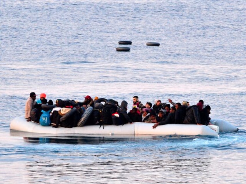 48 migrants rescued from sinking smuggler boat by greek coast guard