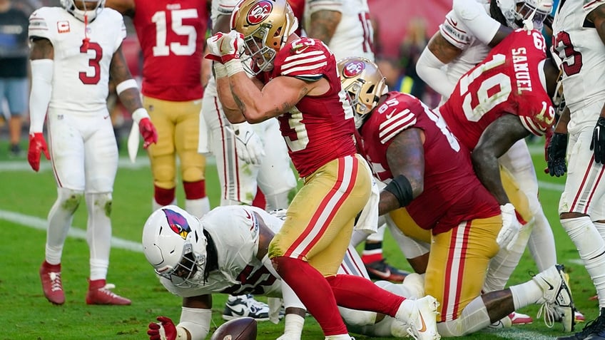 Christian McCaffrey celebrates