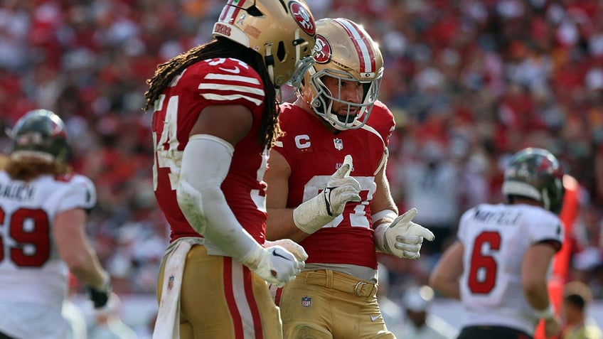 Nick Bosa and Fred Warner 