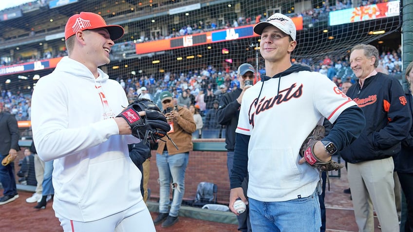 Brock Purdy prepares to throw out the first pitch