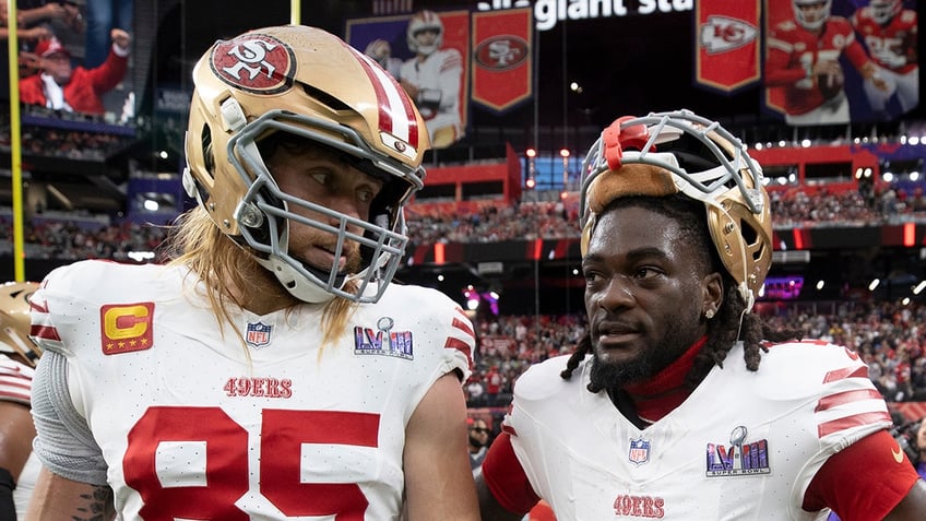 George Kittle looks at Brandon Aiyuk